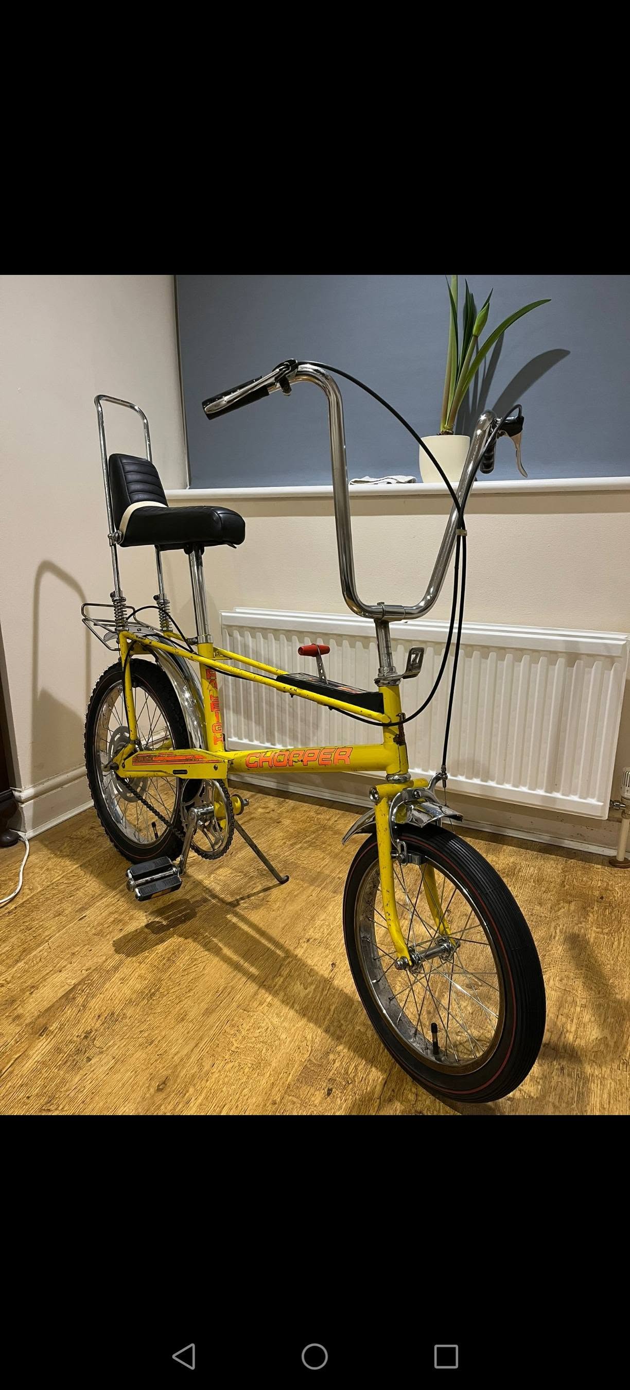 Restored Raleigh Chopper bicycle in yellow