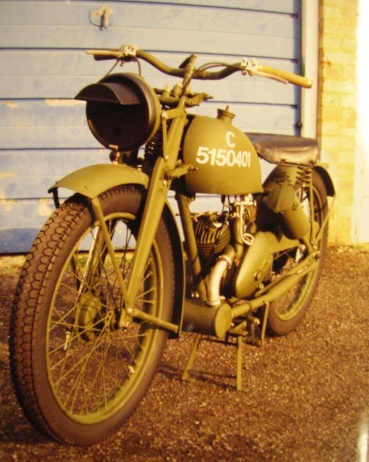 The workshop's restored Royal Enfield Flying Flea in service green