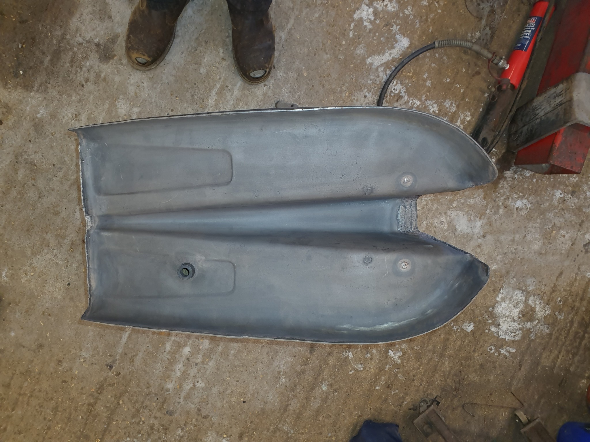 Pair of hand-pressed steel mudguards in bare steel