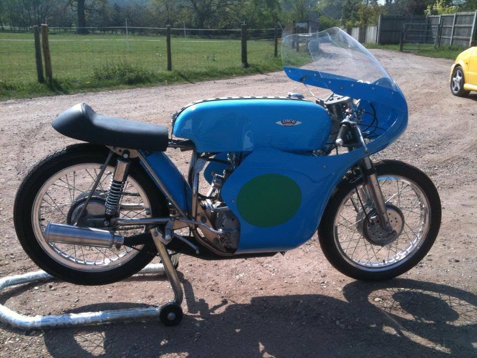 Race motorcycle with hand-made tank, fairing and exhaust
