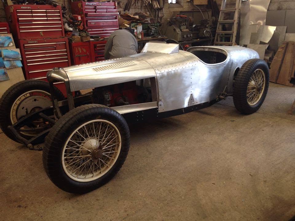 Riley TT Sprite body in raw aluminium on the chassis