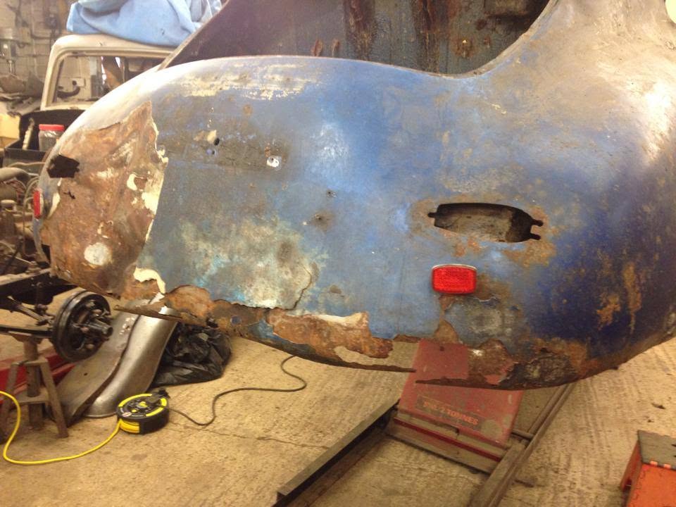Rusted wing cut back to sound metal