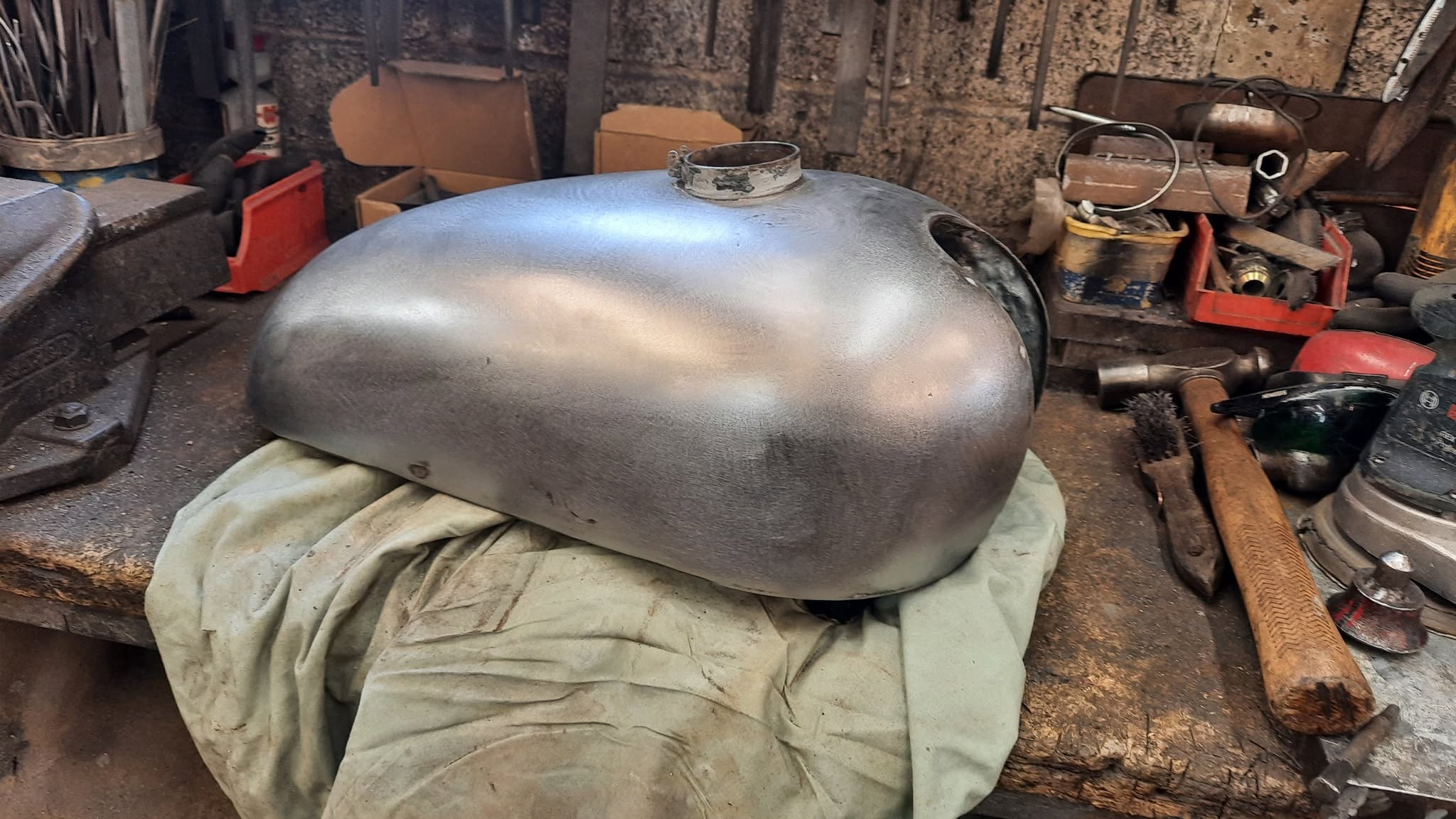 Motorcycle fuel tank repair, taken back to bare steel